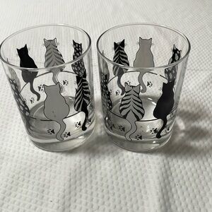 Cocktail Glasses featuring a design of cats and paw print.   Set of 2.